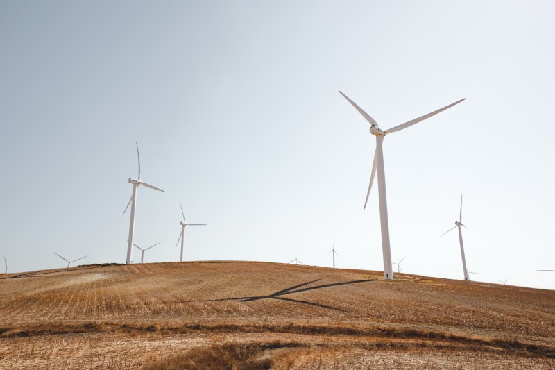 Wind turbines - Photo by Luca Bravo on Unsplash